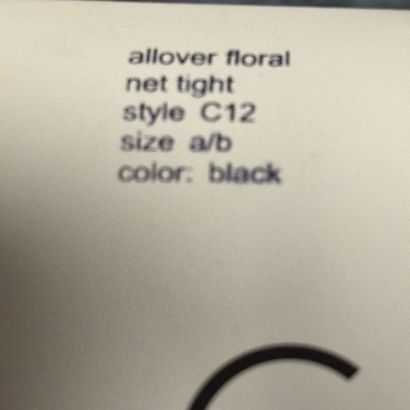 Calvin Klein Allover Floral Net Tight Size A/B Color Black Style C12 - Picture 3 of 3